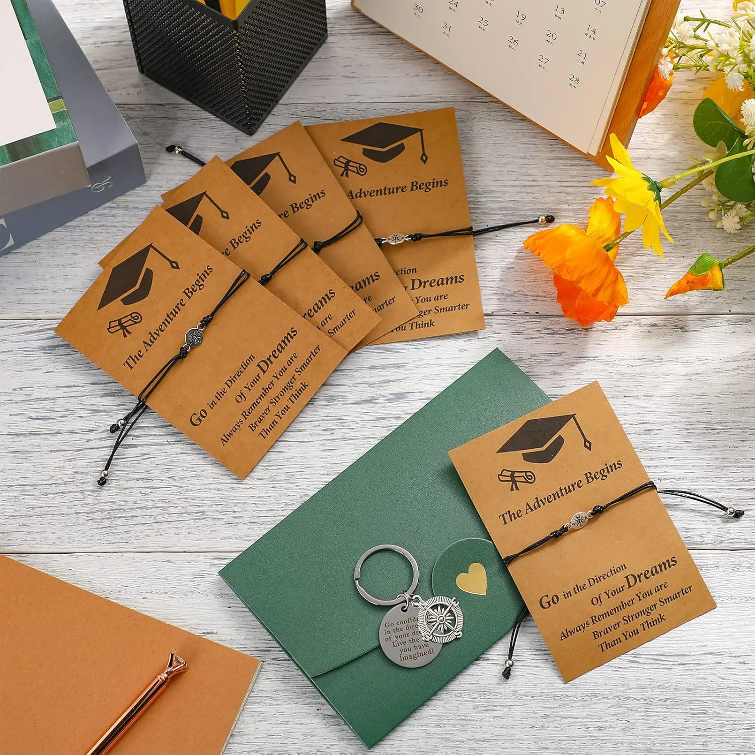 Cunno 12 Sets 2025 Graduation Gifts for Her Him Include 12 Compass Bracelet 12 Graduation Keychain 12 Kraft Envelopes