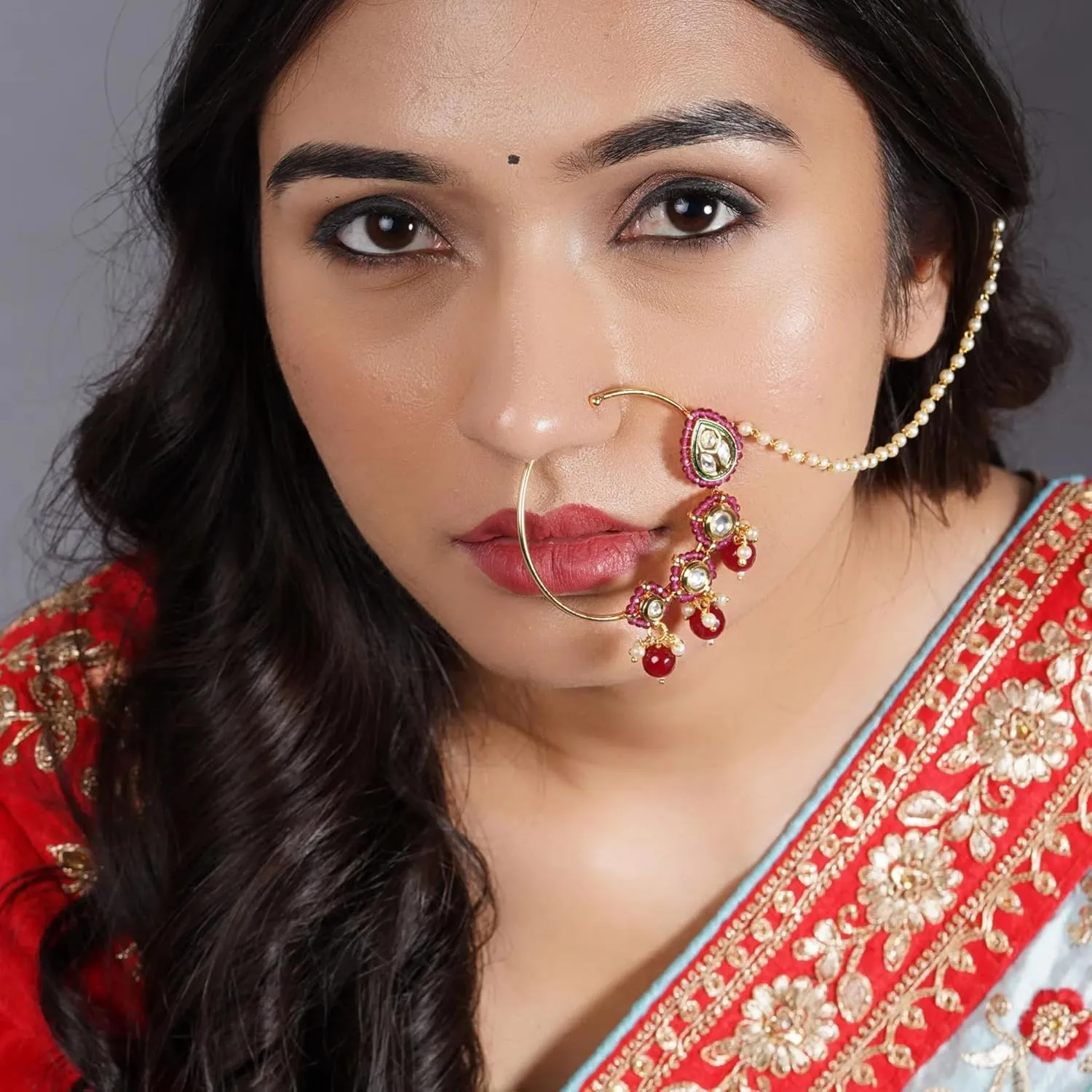 LoveNspire Kundan Crystal Nose Ring with Gold Plating Pearl Hair Chain - Indian Bridal Nath with Faux Pearl Chain Designer Bollywood Style Nose Stud for Women Non-Piercing Nose Accessory Gift for Her