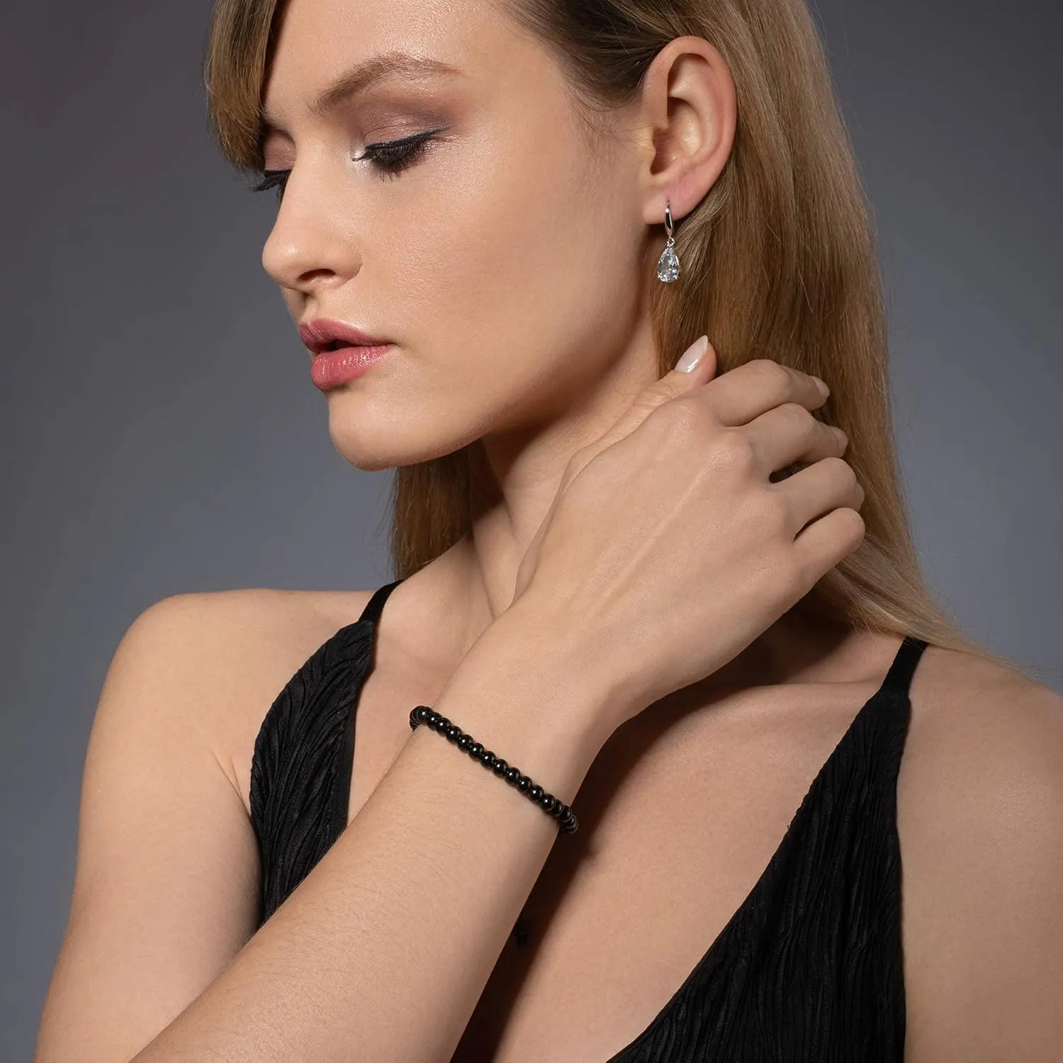 namana Friendship Bracelet for Women with Metal Beads on Adjustable Black Cord. Availaible in Steel Grey, Black, 14 Carat Gold Plated or 14 Carat Rose Gold Plated.