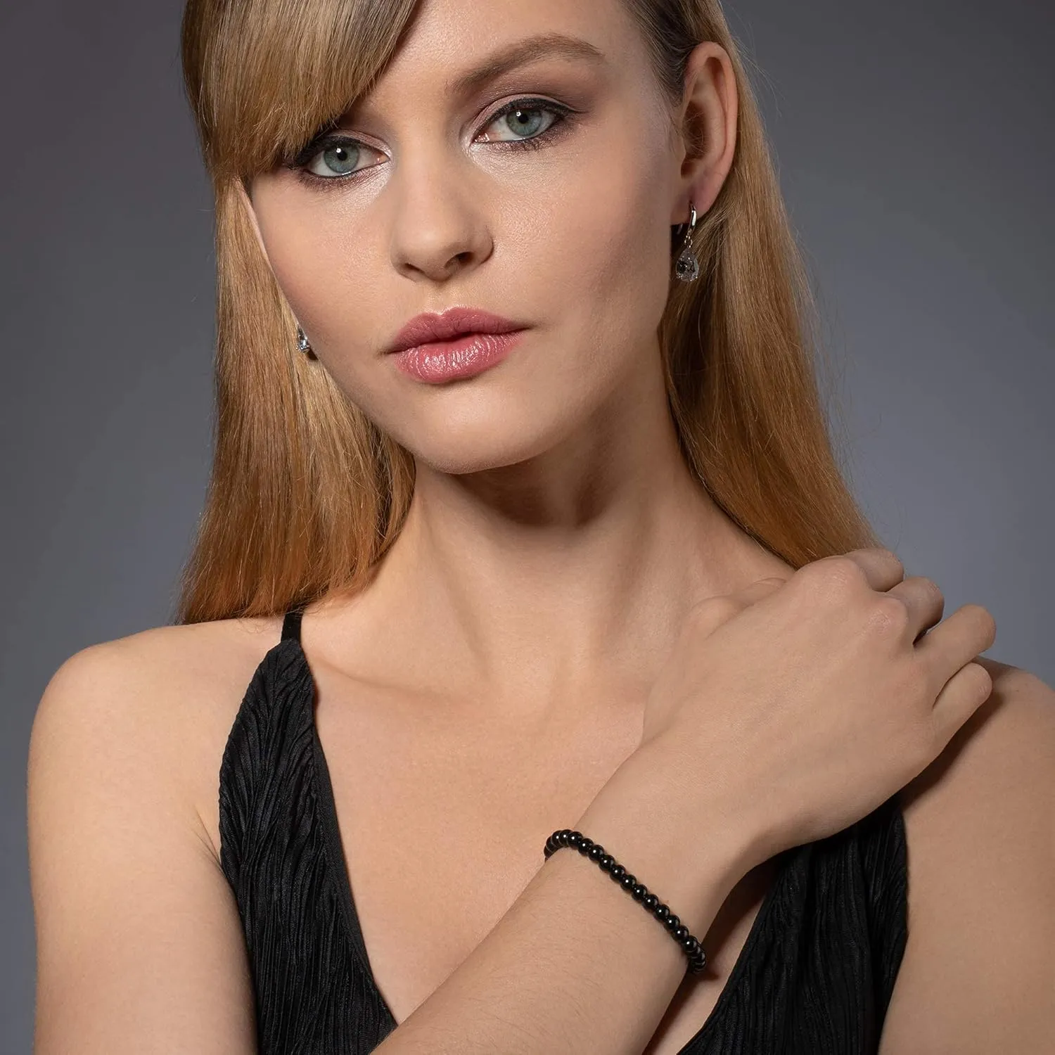 namana Friendship Bracelet for Women with Metal Beads on Adjustable Black Cord. Availaible in Steel Grey, Black, 14 Carat Gold Plated or 14 Carat Rose Gold Plated.
