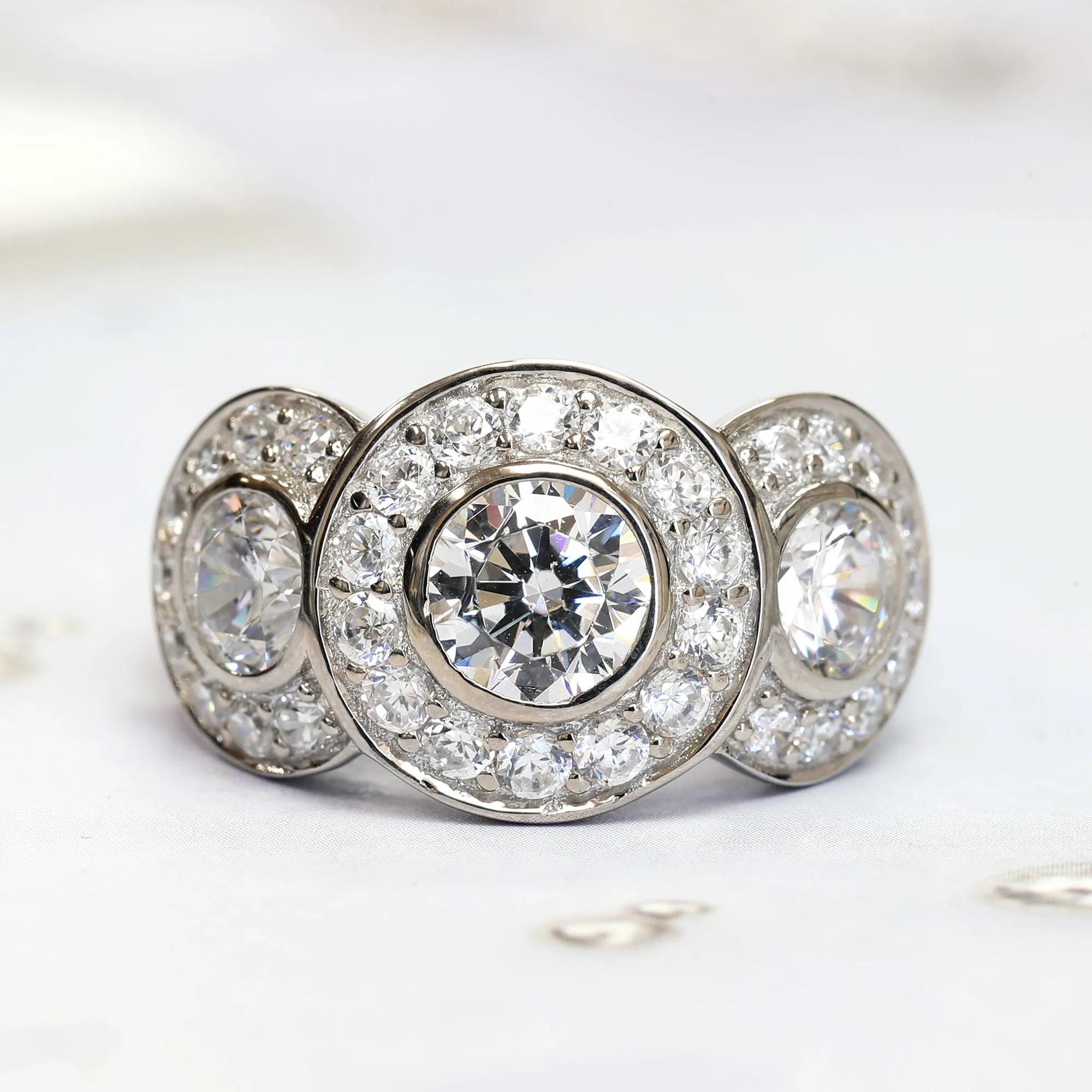 Sterling Silver 1.5 CT Simulated Diamond Three Stone Halo Wide Eternity Ring