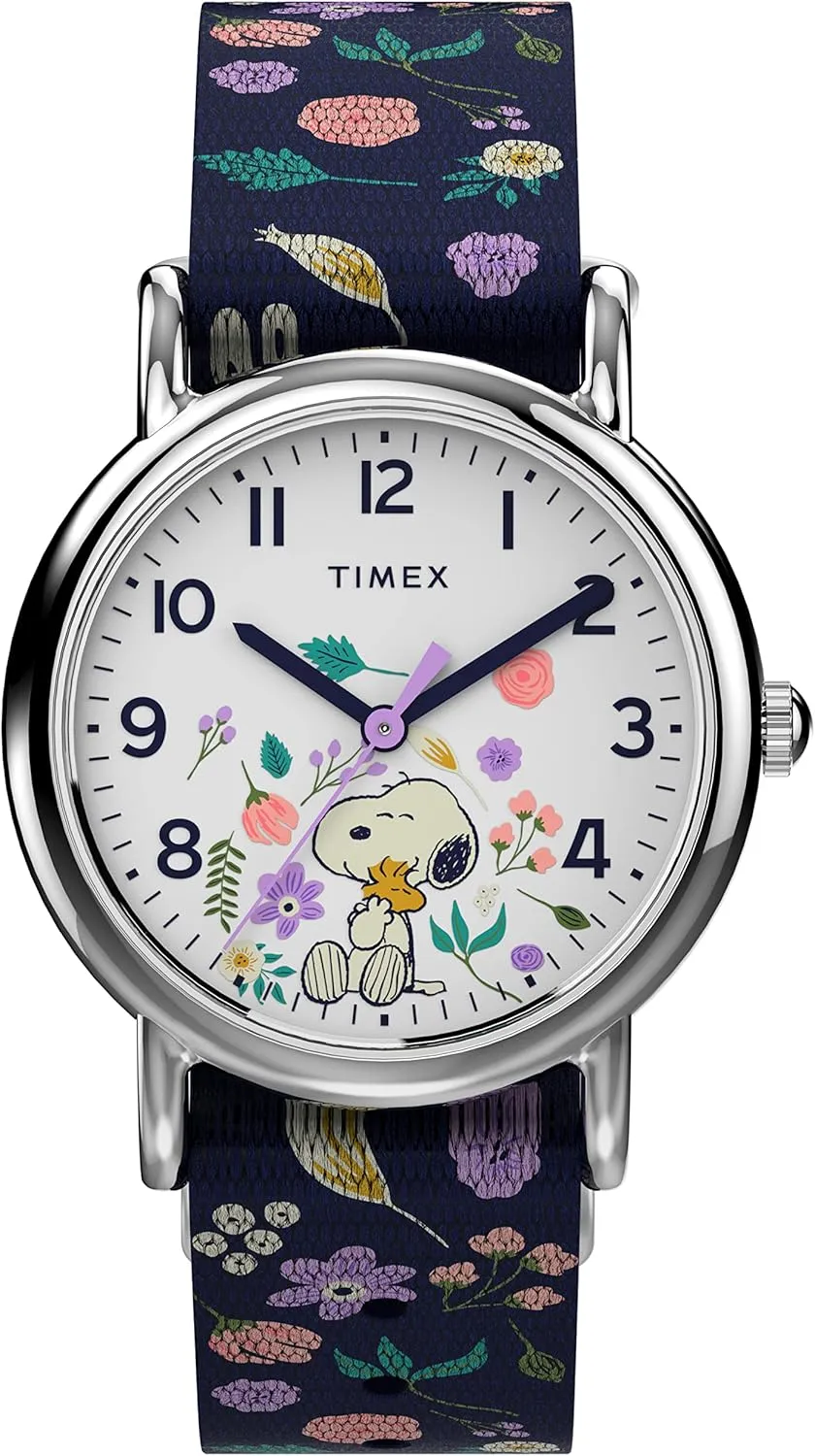 Timex Womens Watch Peanuts Weekender Casual Ladies Wristwatch - Featuring Snoopy and Woodstock in a Floral Motif, Silver-Tone Case with Blue Fabric Strap (31mm)